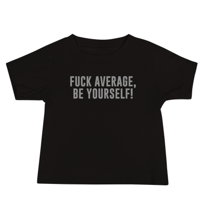 "Fuck Average, Be Yourself!" printed on a black baby jersey short sleeve tee laying on a flat surface