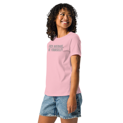 "Fuck Average, Be Yourself!" printed on a pink women's relaxed t-shirt worn by a female