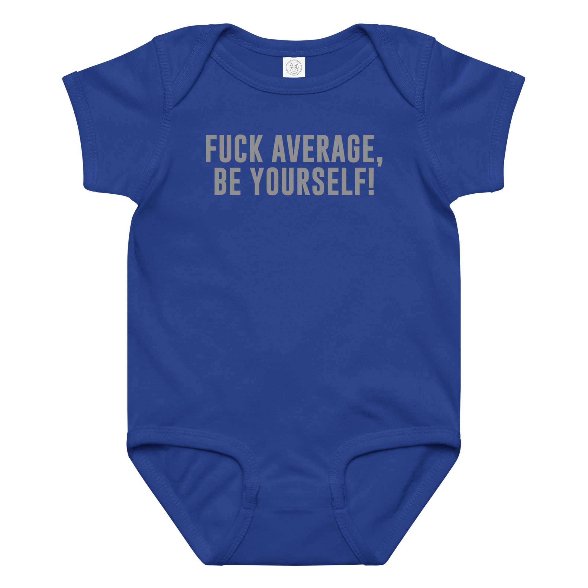 "Fuck Average, Be Yourself!" printed on a royal baby jersey bodysuit laying on a flat surface amongst other clothes