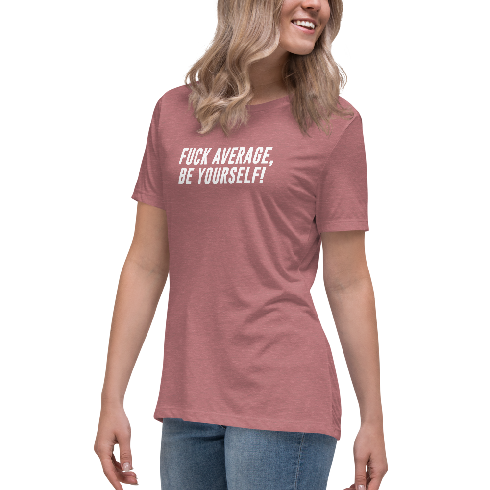 "Fuck Average, Be Yourself!" printed on a heather mauve women's relaxed t-shirt worn by a female