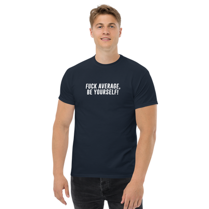 "Fuck Average, Be Yourself!" printed on a navy unisex classic tee worn by a male