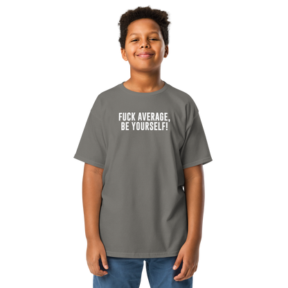 "Fuck Average, Be Yourself!" printed on a charcoal youth classic tee worn by a male