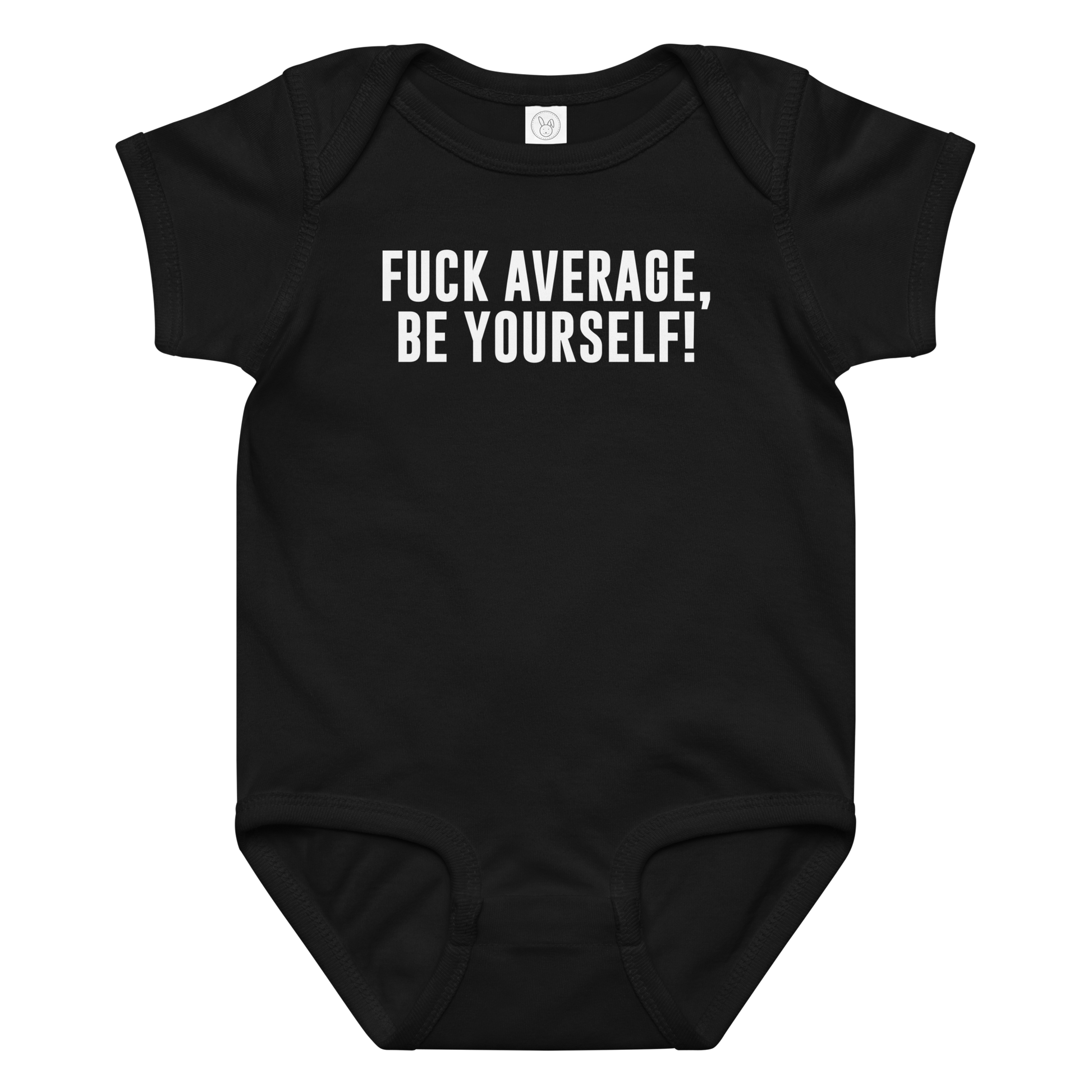 "Fuck Average, Be Yourself!" printed on a black baby jersey bodysuit laying on a flat surface amongst other clothes