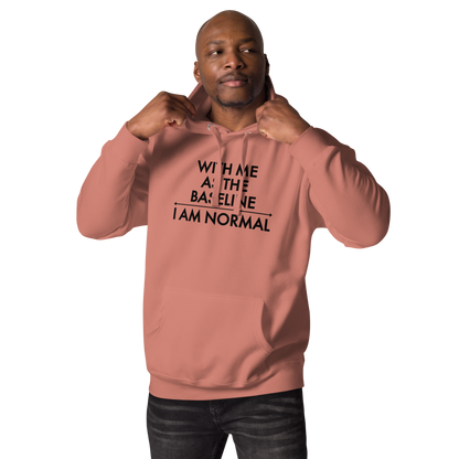 "With me as the baseline, I am normal" printed on a dusty rose unisex hoodie worn by a male