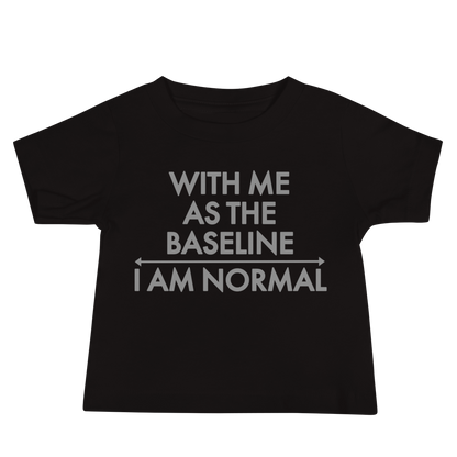 "With me as the baseline, I am normal" printed on a black baby jersey short sleeve tee laying on a flat surface