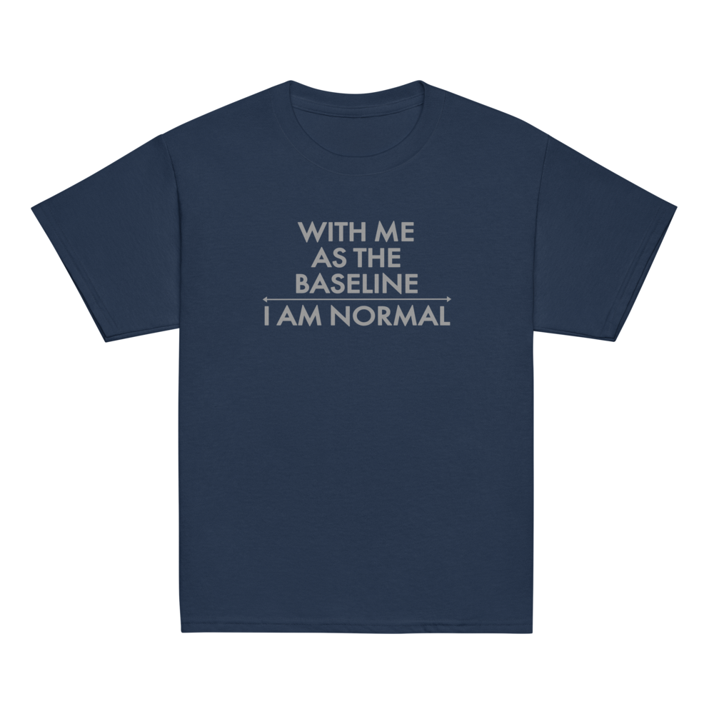 "With me as the baseline, I am normal" printed on a navy youth classic tee laying on a flat surface