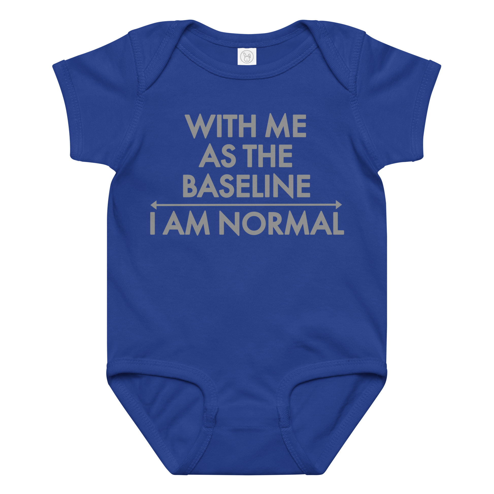 "With me as the baseline, I am normal" printed on a royal baby jersey bodysuit laying on a flat surface amongst other clothes