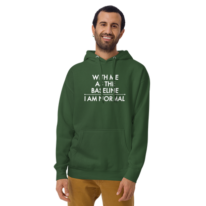 "With me as the baseline, I am normal" printed on a forest green warn by a male