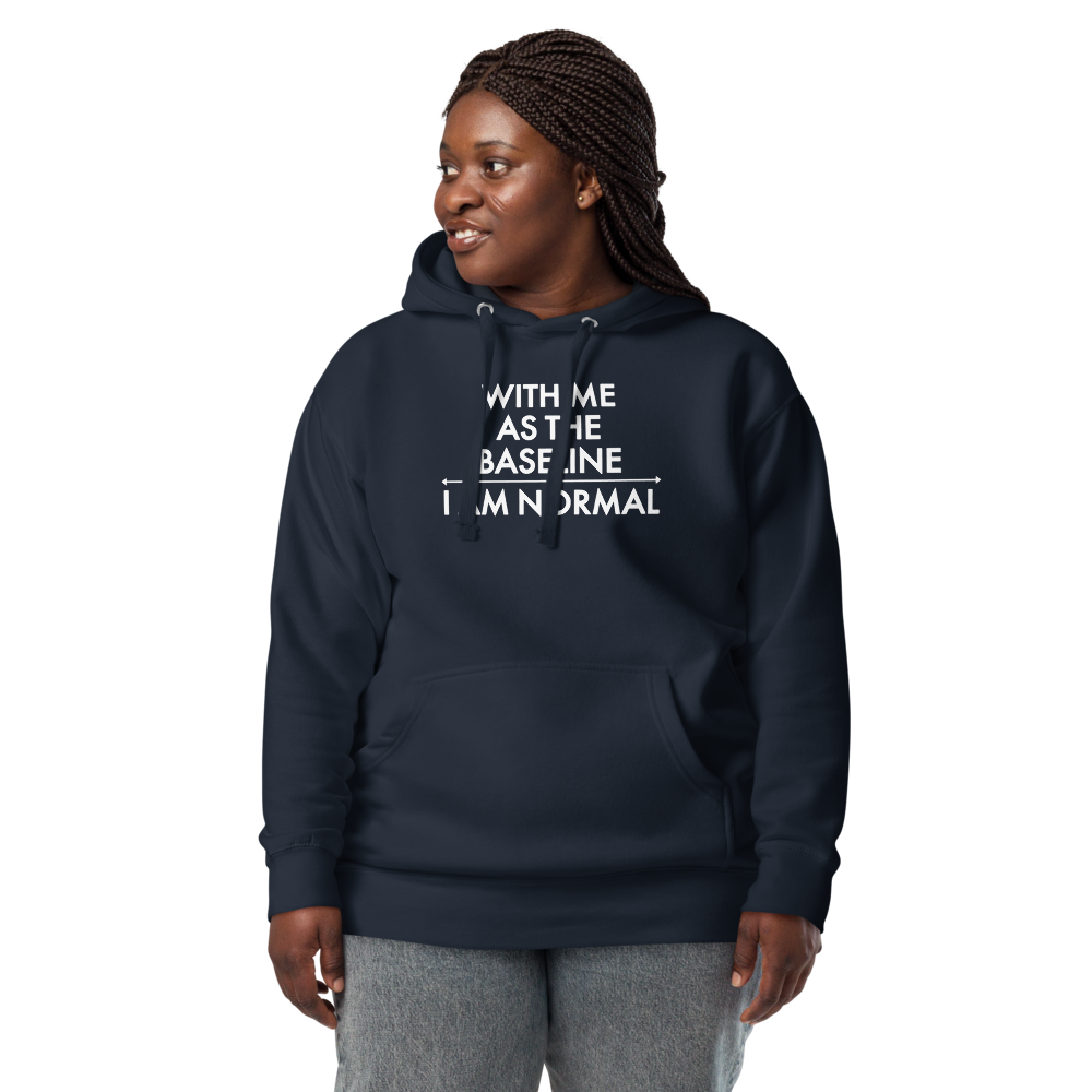 "With me as the baseline, I am normal" printed on a navy blazer unisex hoodie worn by a female