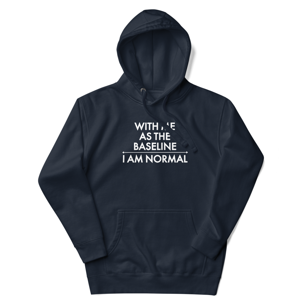 "With me as the baseline, I am normal" printed on a navy blazer unisex hoodie laying on a flat surface with the hood up