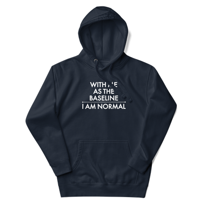 "With me as the baseline, I am normal" printed on a navy blazer unisex hoodie laying on a flat surface with the hood up