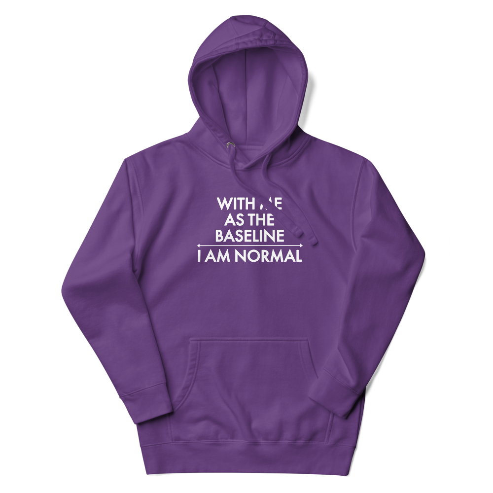 "With me as the baseline, I am normal" printed on a purple unisex hoodie laying on a flat surface with the hood up