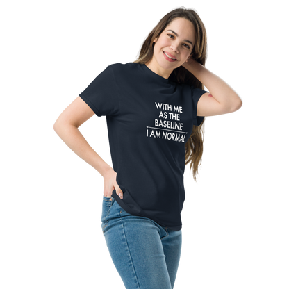 "With me as the baseline, I am normal" printed on a navy unisex classic tee worn by a female