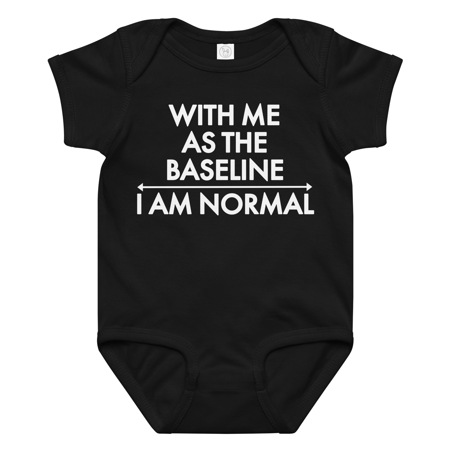 "With me as the baseline, I am normal" printed on a black baby jersey bodysuit laying on a flat surface amongst other clothes