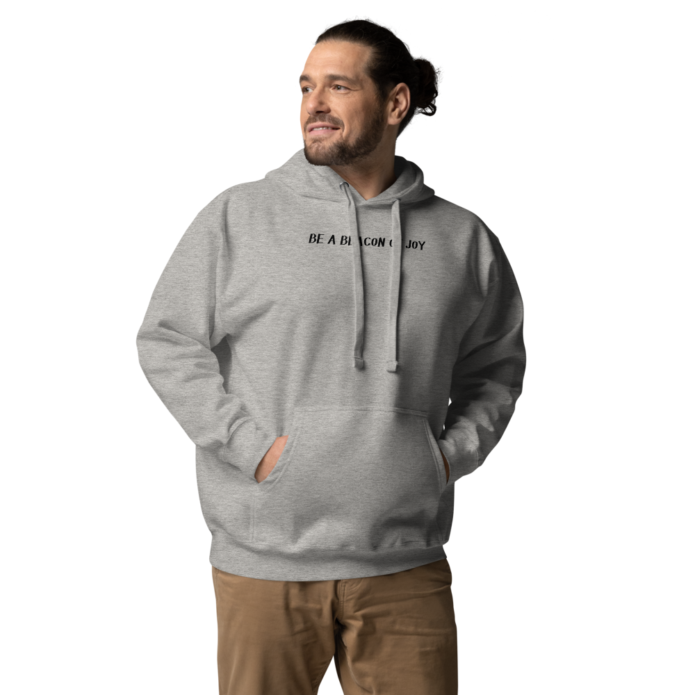 "Be a beacon of joy" printed on a carbon grey unisex hoodie worn by a male