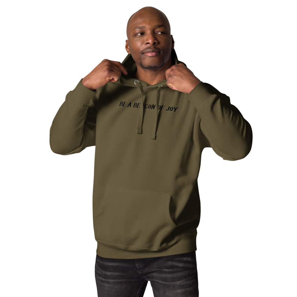 "Be a beacon of joy" printed on a military green unisex hoodie worn by a male