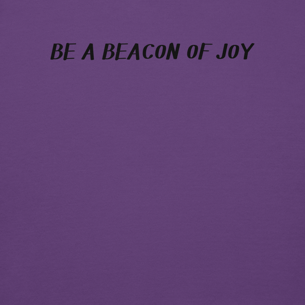 "Be a beacon of joy" printed on a purple background