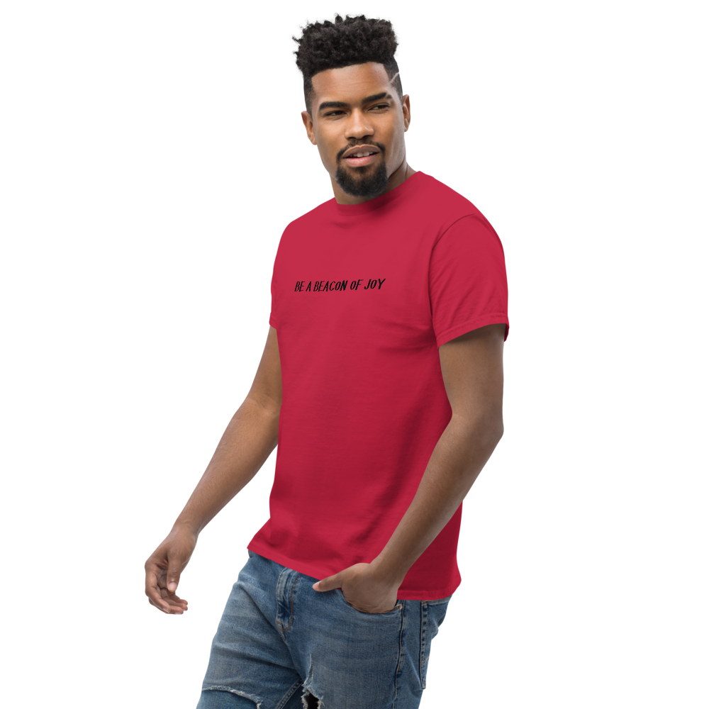 "Be a beacon of joy" printed on a cardinal unisex classic tee worn by a male