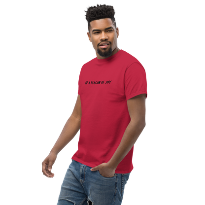 "Be a beacon of joy" printed on a cardinal unisex classic tee worn by a male