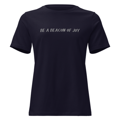 "Be a beacon of joy" printed on a navy on an invisible / simulated body
