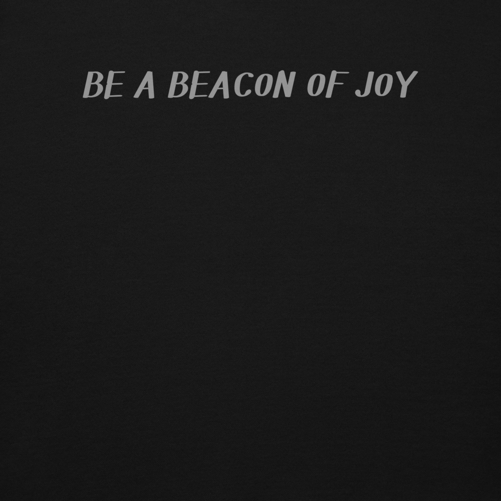 "Be a beacon of joy" printed on a black background