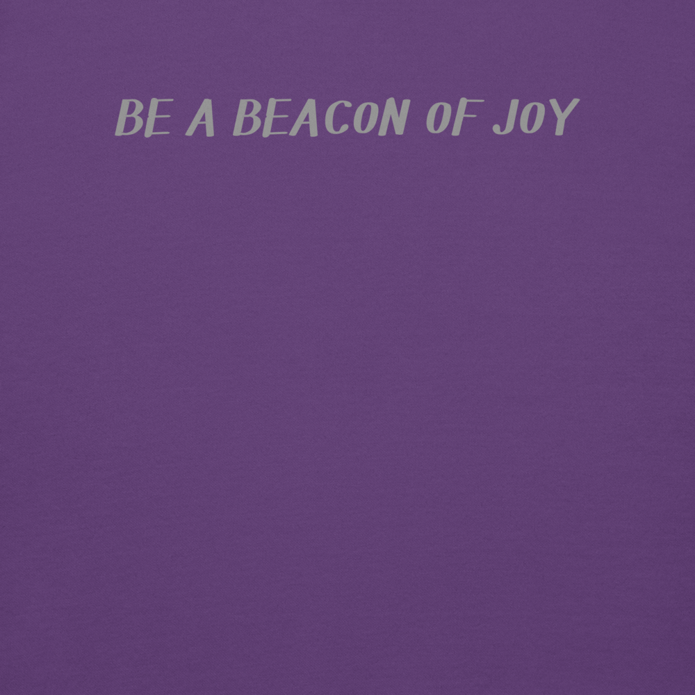 "Be a beacon of joy" printed on a purple background