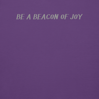 "Be a beacon of joy" printed on a purple background