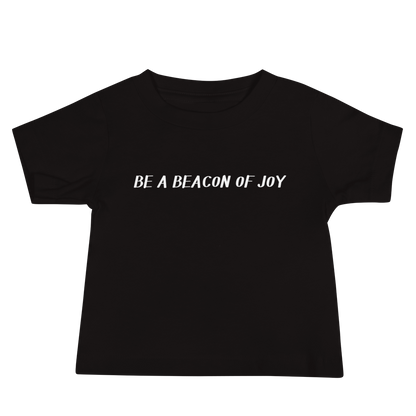 "Be a beacon of joy" printed on a black baby jersey short sleeve tee laying on a flat surface