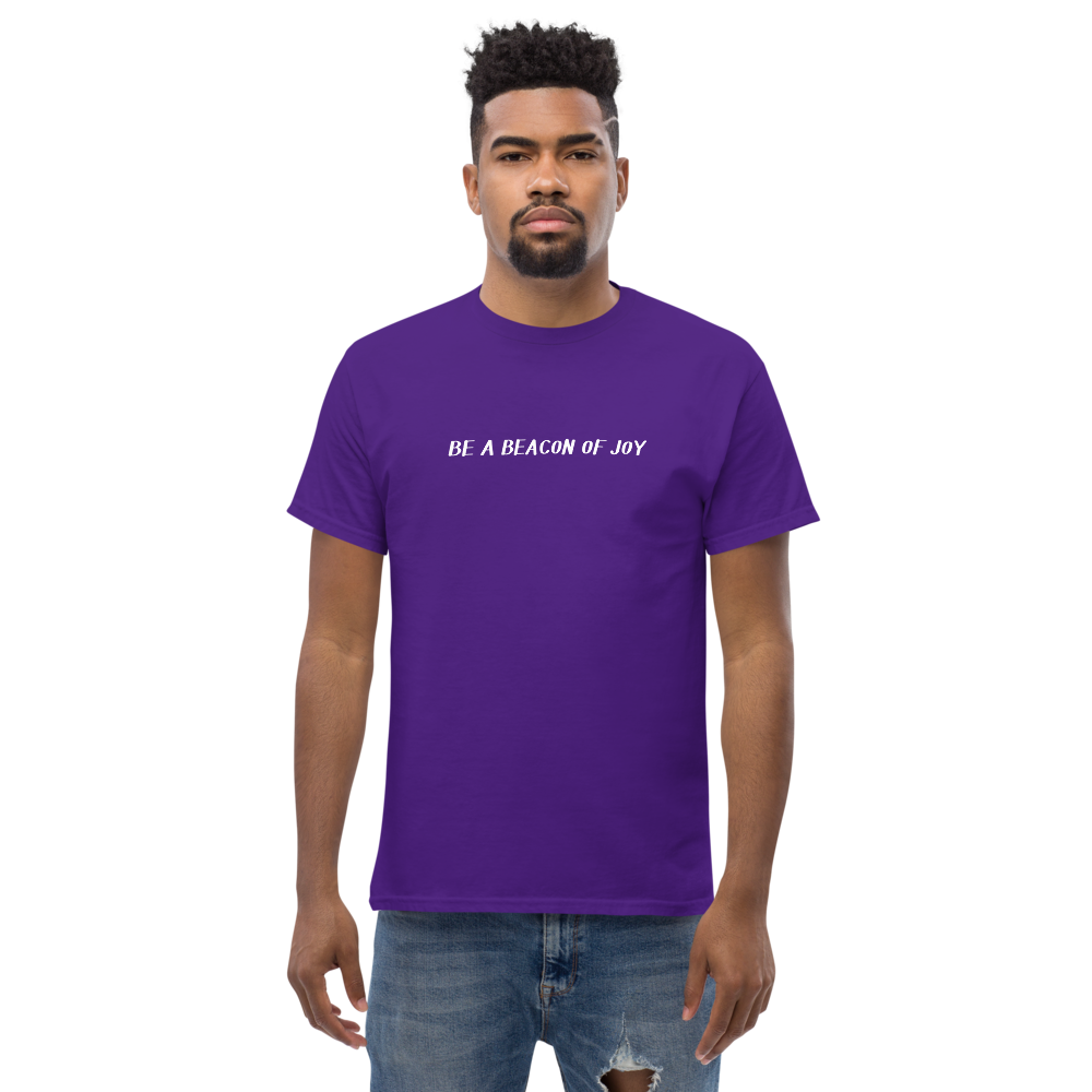 "Be a beacon of joy" printed on a purple unisex classic tee worn by a male