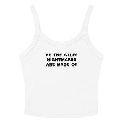 "Be the stuff nightmares are made of" printed on a solid white blend women's micro-rib tanktop laying on a flat surface amongst sunglasses and shorts
