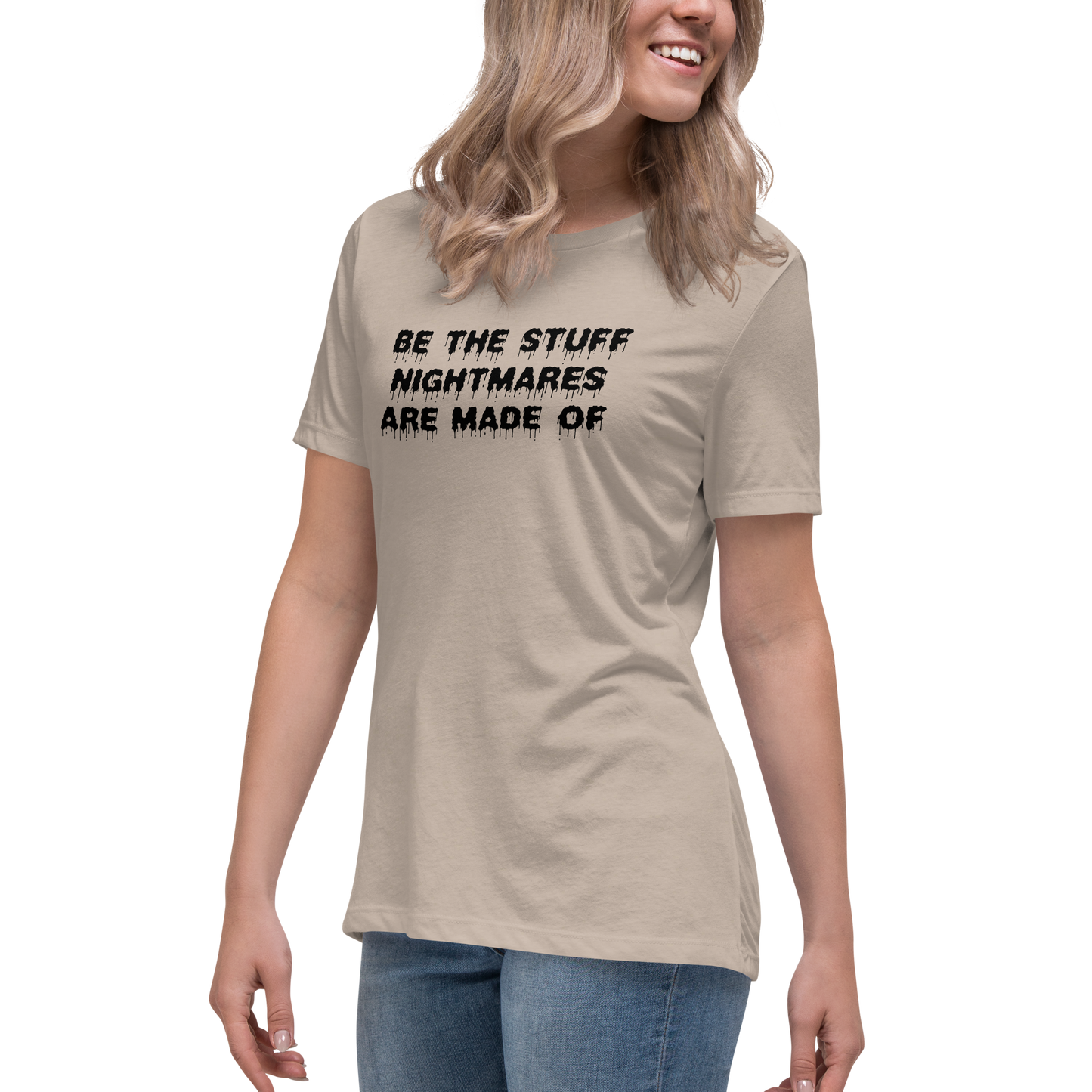"Be the stuff nightmares are made of" printed on a heather stone women's relaxed t-shirt worn by a female