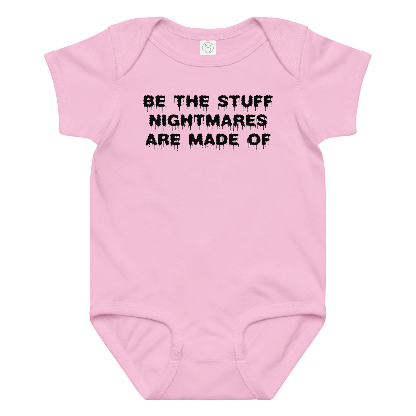 "Be the stuff nightmares are made of" printed on a pink baby jersey bodysuit laying on a flat surface amongst other clothes