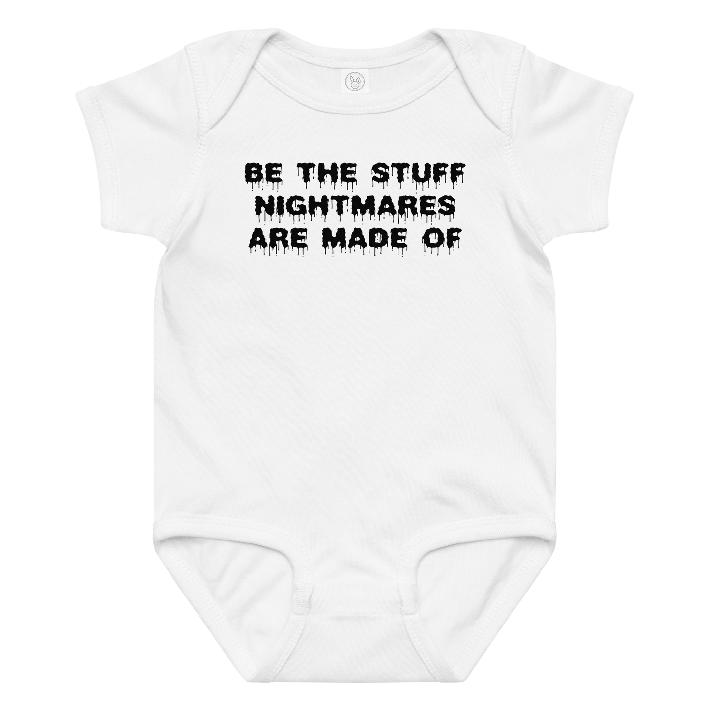 "Be the stuff nightmares are made of" printed on a white baby jersey bodysuit laying on a flat surface amongst other clothes