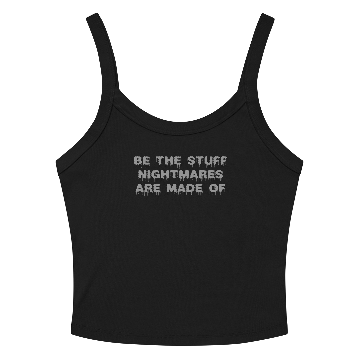 "Be the stuff nightmares are made of" printed on a solid black blend women's micro-rib tanktop laying on a flat surface amongst sunglasses and shorts