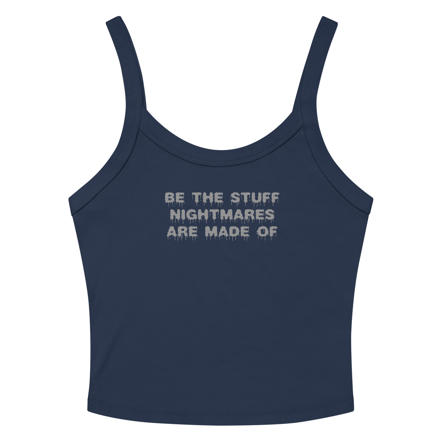 "Be the stuff nightmares are made of" printed on a solid navy blend women's micro-rib tanktop laying on a flat surface amongst sunglasses and shorts
