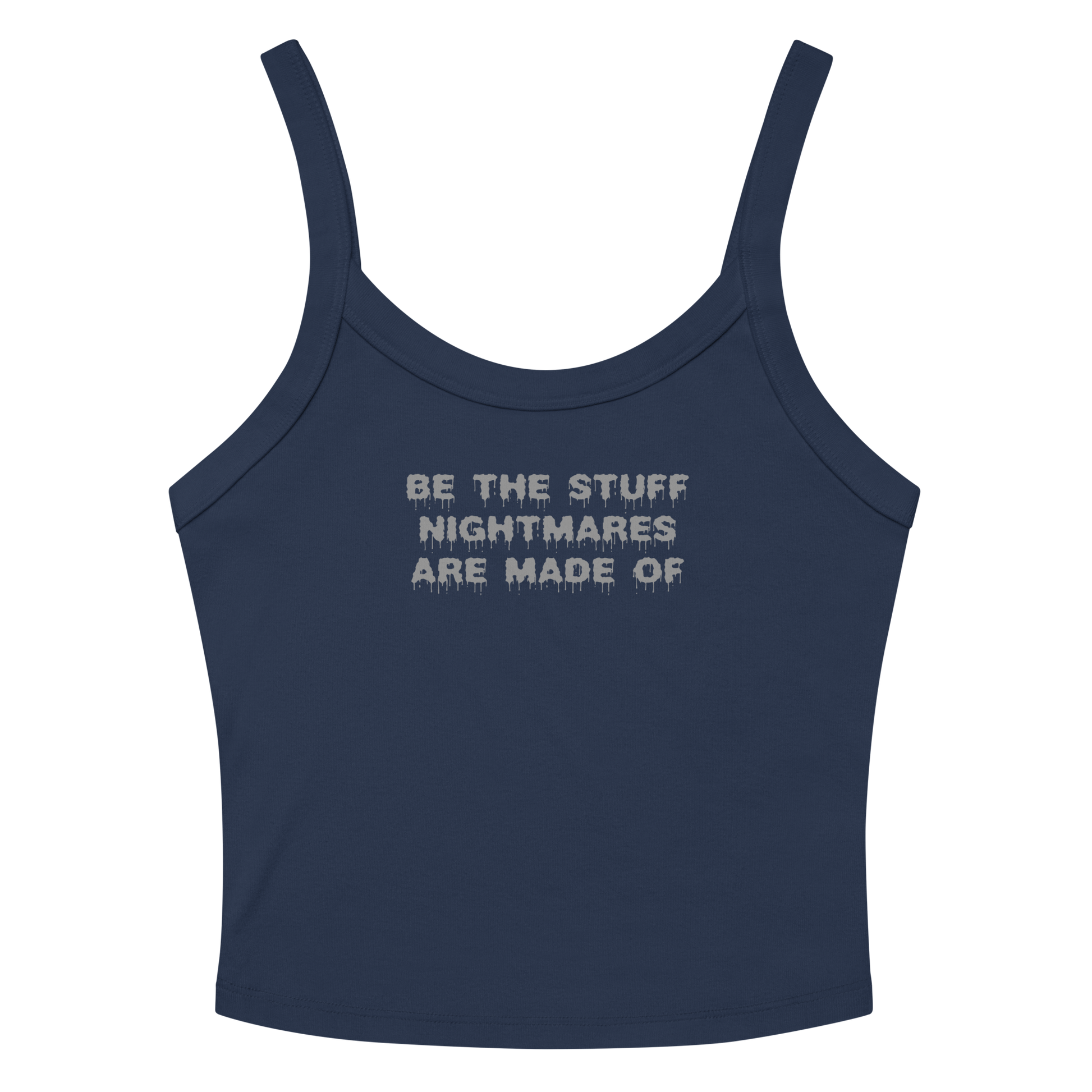 "Be the stuff nightmares are made of" printed on a solid navy blend women's micro-rib tanktop laying on a flat surface amongst sunglasses and shorts