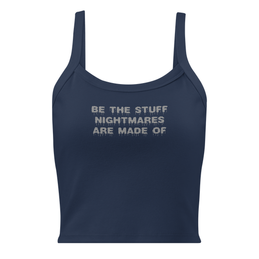 "Be the stuff nightmares are made of" printed on a solid navy blend women's micro-rib tanktop laying on a flat surface