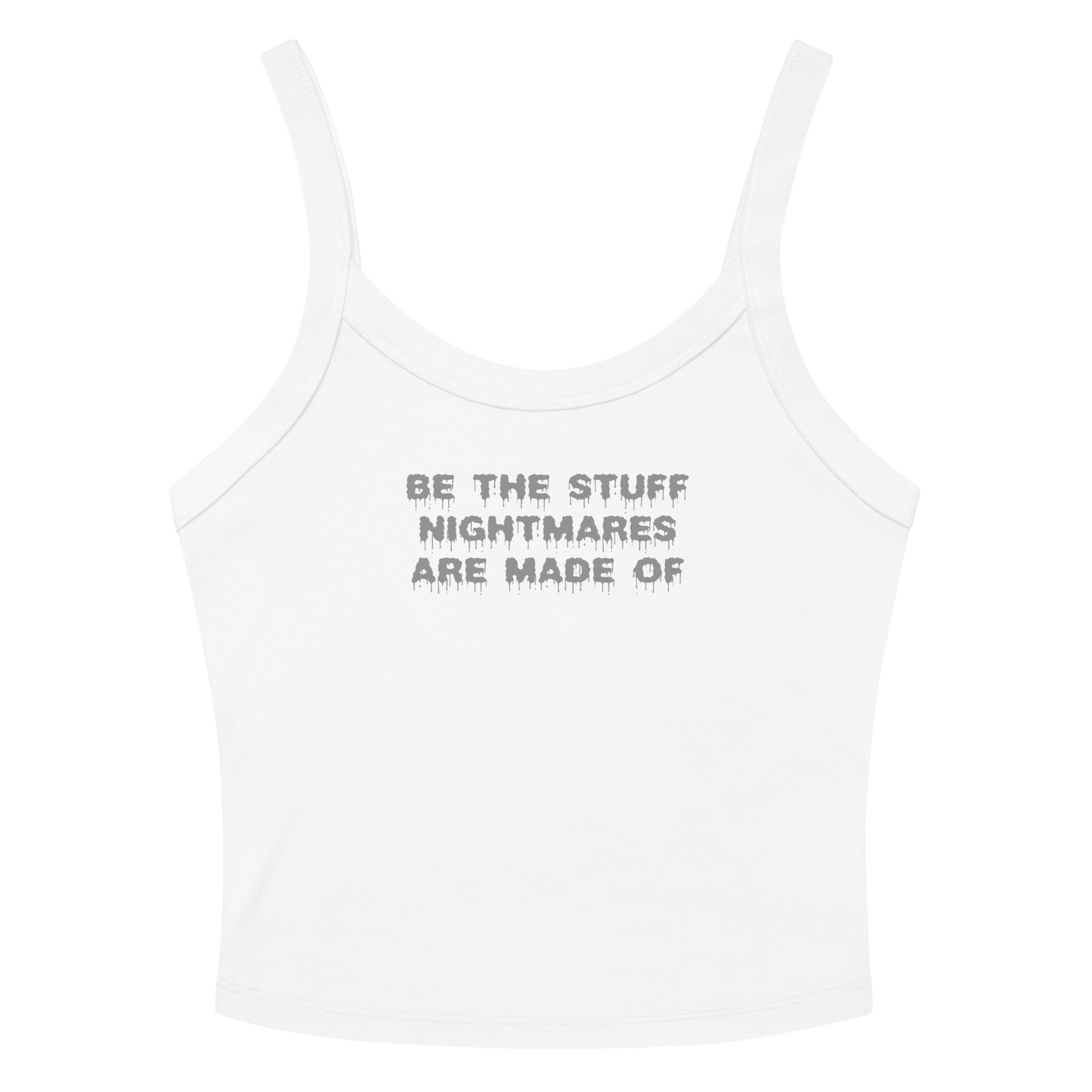"Be the stuff nightmares are made of" printed on a solid white blend women's micro-rib tanktop laying on a flat surface amongst sunglasses and shorts