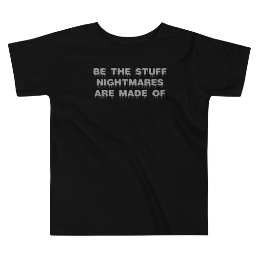 "Be the stuff nightmares are made of" printed on a black toddler short sleeve tee laying on a flat surface