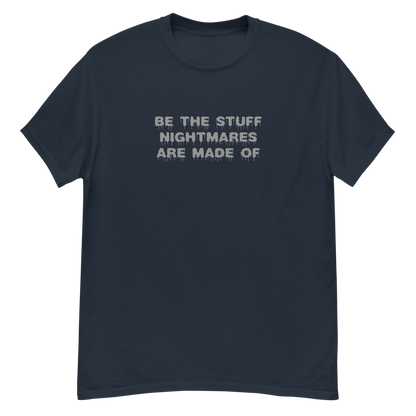 "Be the stuff nightmares are made of" printed on a navy unisex classic tee laying on a flat surface