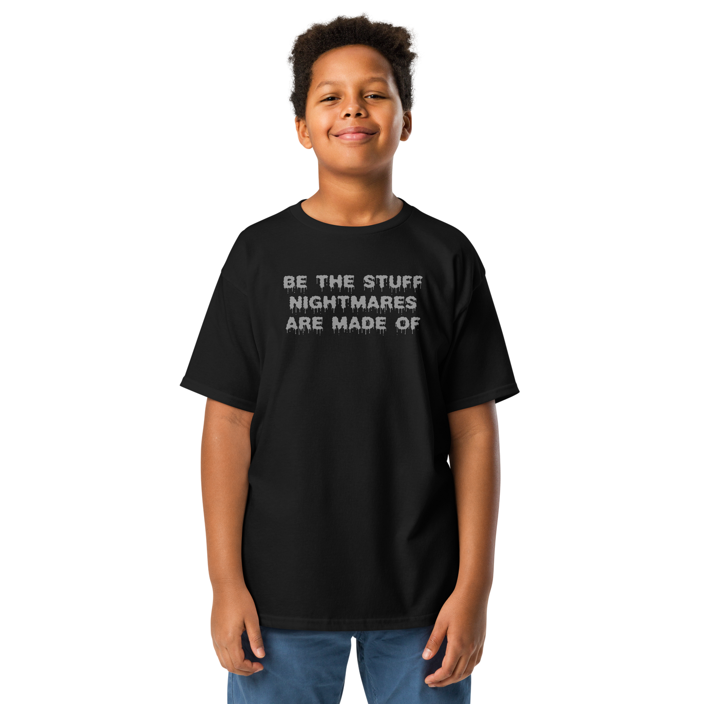 "Be the stuff nightmares are made of" printed on a black youth classic tee worn by a male