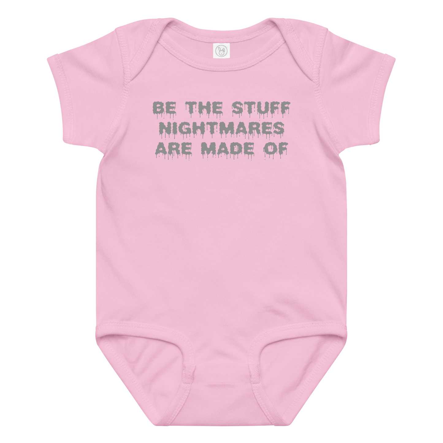 "Be the stuff nightmares are made of" printed on a pink baby jersey bodysuit laying on a flat surface amongst other clothes