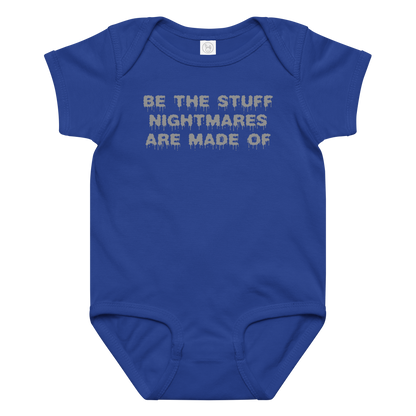 "Be the stuff nightmares are made of" printed on a royal baby jersey bodysuit laying on a flat surface amongst other clothes