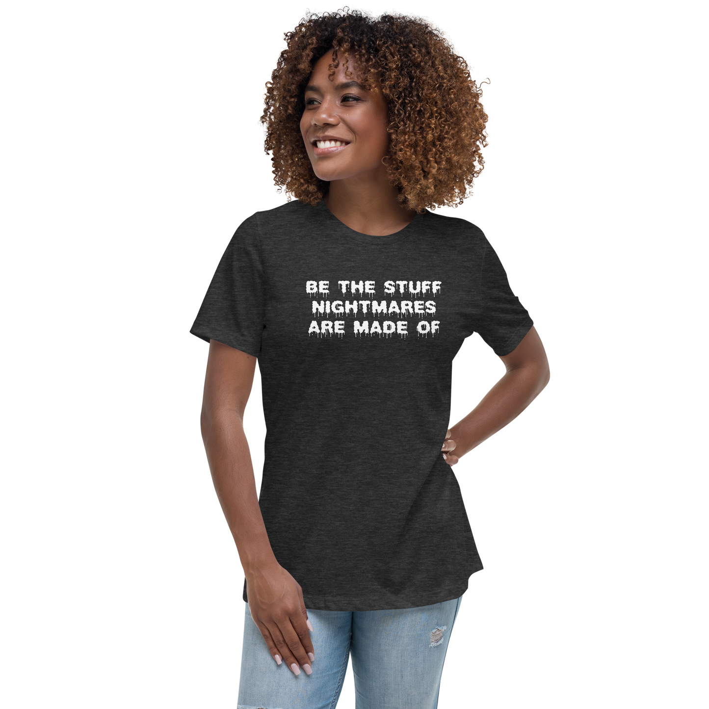 "Be the stuff nightmares are made of" printed on a dark grey heather women's relaxed t-shirt worn by a female