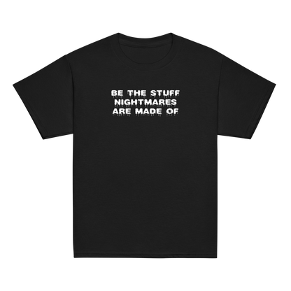 "Be the stuff nightmares are made of" printed on a black youth classic tee laying on a flat surface