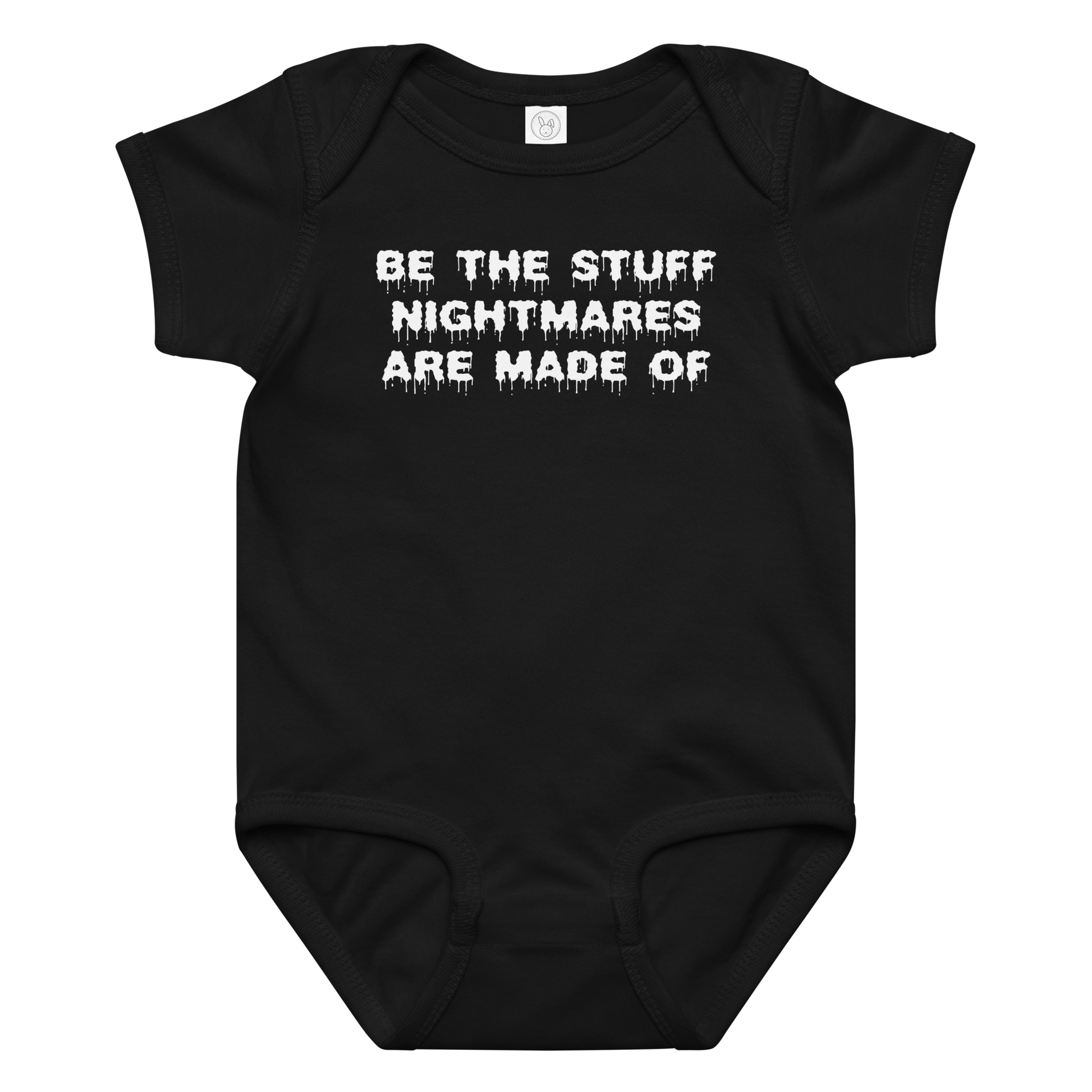 "Be the stuff nightmares are made of" printed on a black baby jersey bodysuit laying on a flat surface amongst other clothes