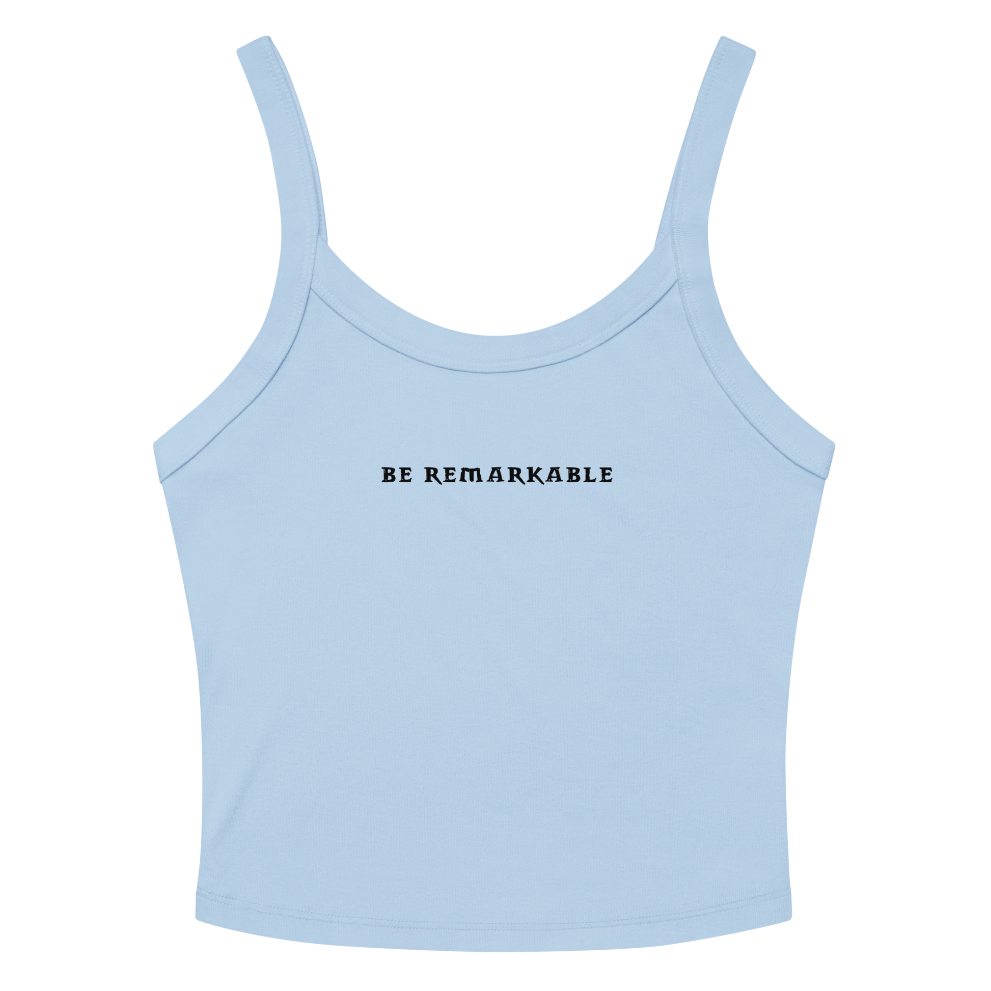 "Be remarkable" printed on a solid baby blue blend women's micro-rib tanktop laying on a flat surface amongst sunglasses and shorts