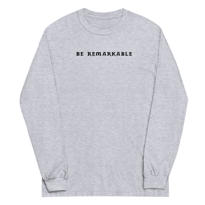 "Be remarkable" printed on a sport grey men's long sleeve shirt laying on a flat surface