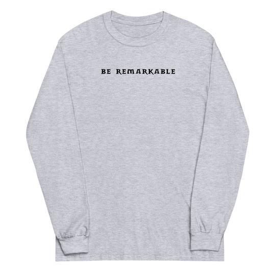 "Be remarkable" printed on a sport grey men's long sleeve shirt laying on a flat surface