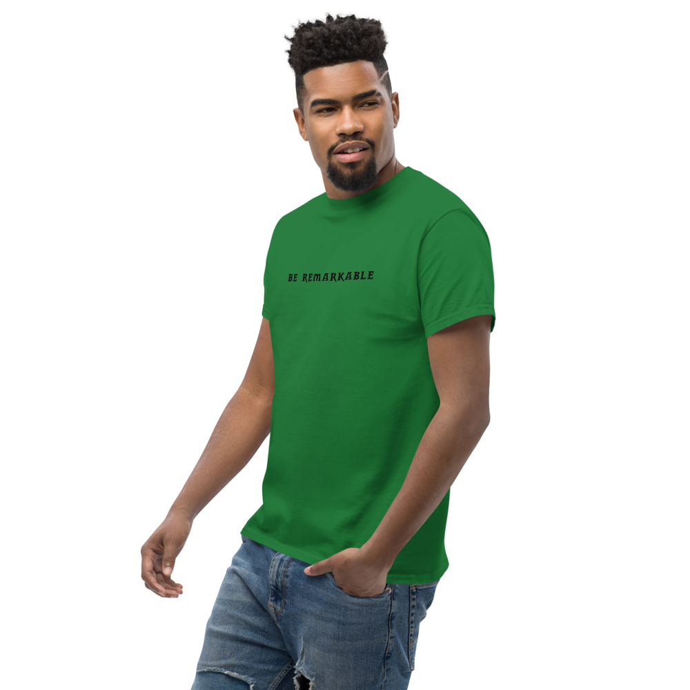 "Be remarkable" printed on a turf green unisex classic tee worn by a male